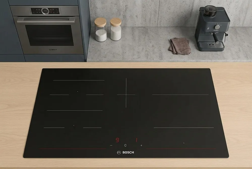 Induction cooktop in an all-electric Ozcan Group kitchen